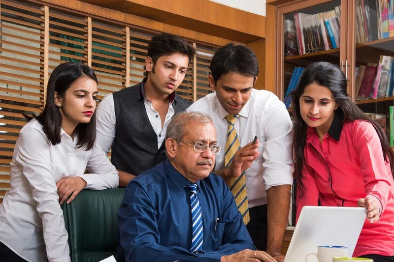 Faculty Explaining Concepts to Students in an Office Room Setting