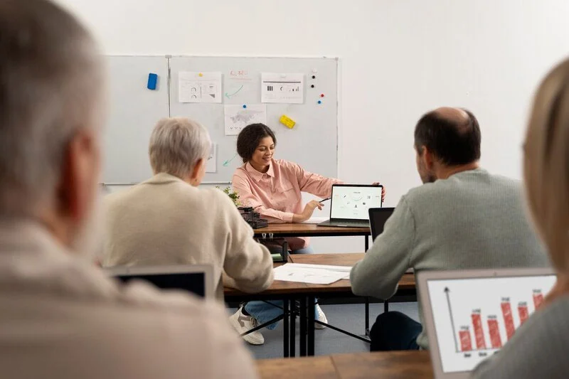 Lecturers Discussing and Collaborating in the Staff Room