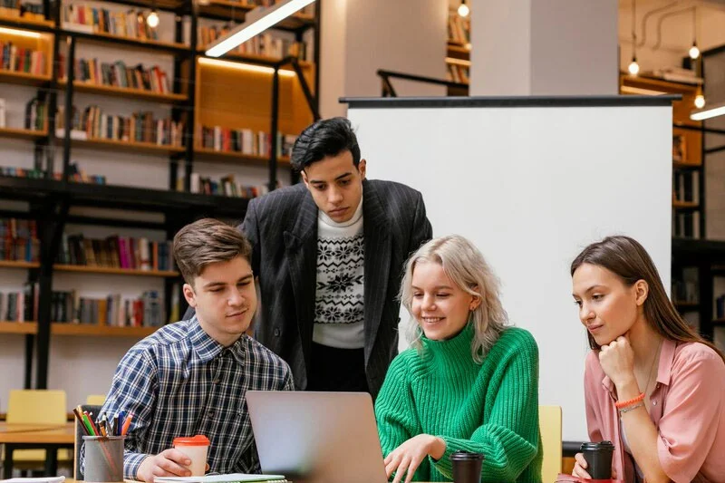 Lecturer Explaining Concepts to Students in a Classroom Environment